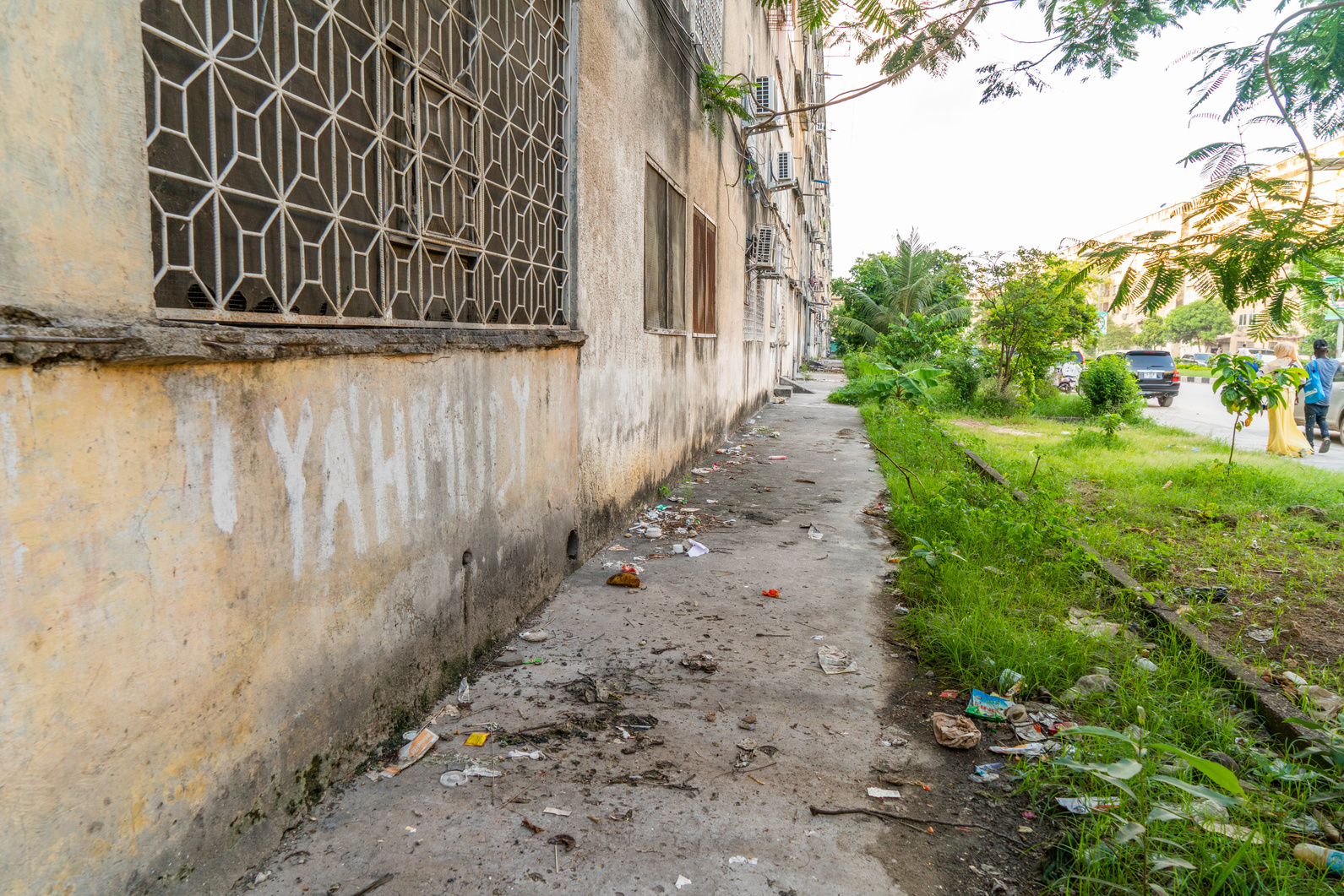 Dirty sidewalk along apartment blocks, Zanzibar, Tanzania